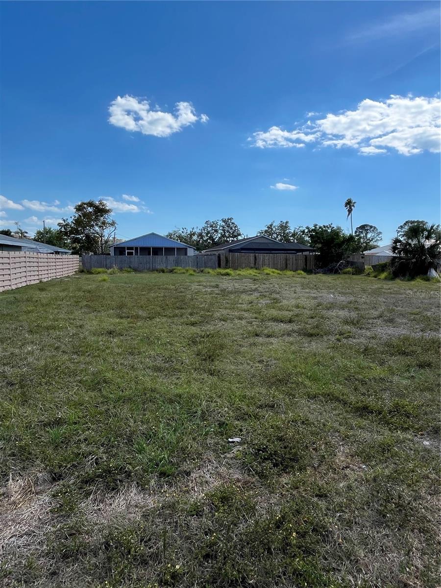 Rare Opportunity to Purchase a Beautiful Building Lot in the Tropical Shores Neighborhood Area just East of the Trail at this Price! The Lot Next Door is also for Available for Sale (MLS A4641765) so you could potentially Own a Double Lot and Build a Fantastic House close to the Water and yet be in a NO Flood Zone! Lot size is 50x126. Non-Deed Restricted. Park your Boat or RV at Home! NO HOA. Community Boat Ramp Close By. Just Minutes to Shopping, Costco, Restaurants, Bus Transportation and Beaches!