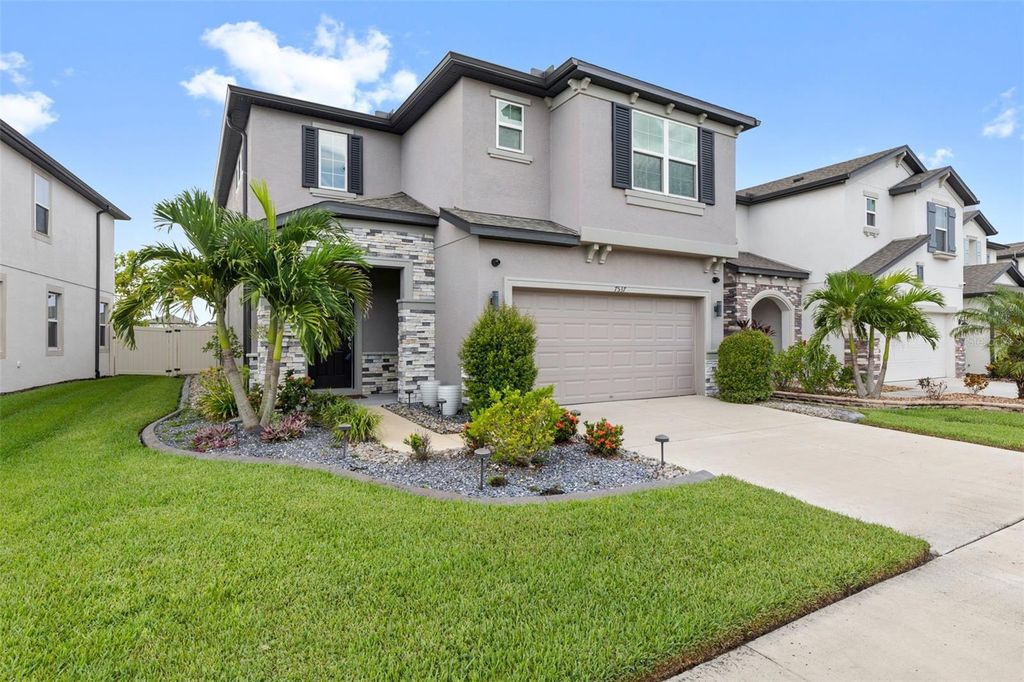 Photo of 7537 Pool Compass Loop, Wesley Chapel, FL 33545 (MLS # TB8481261)