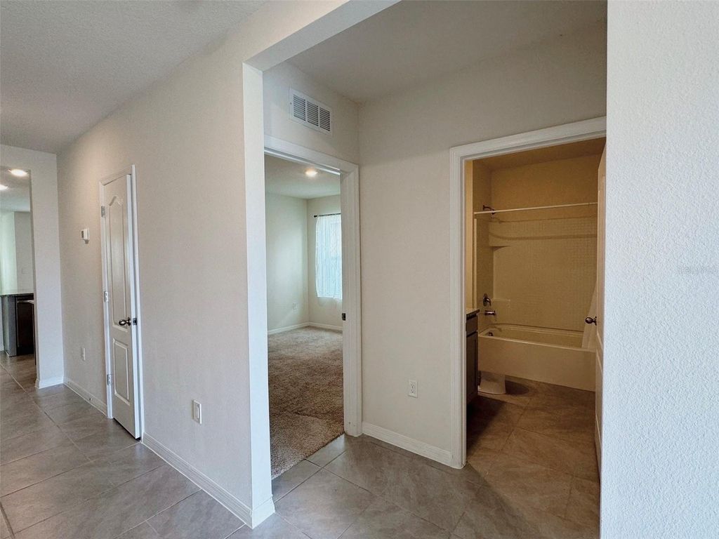 Photo of 569 Talisi Loop, Saint Cloud, FL 34771 (MLS # O6370747)