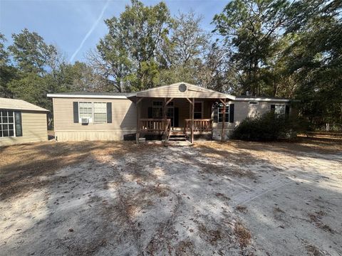 Photo of 595 SW Trenton Terrace, Fort White, FL 32038 (MLS # GC536760)
