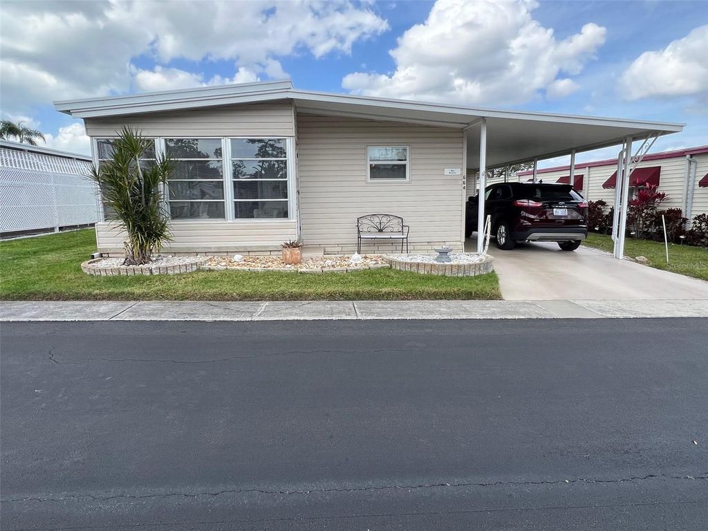 Photo of 664 Sugar Palm Street, Largo, FL 33778 (MLS # TB8450291)