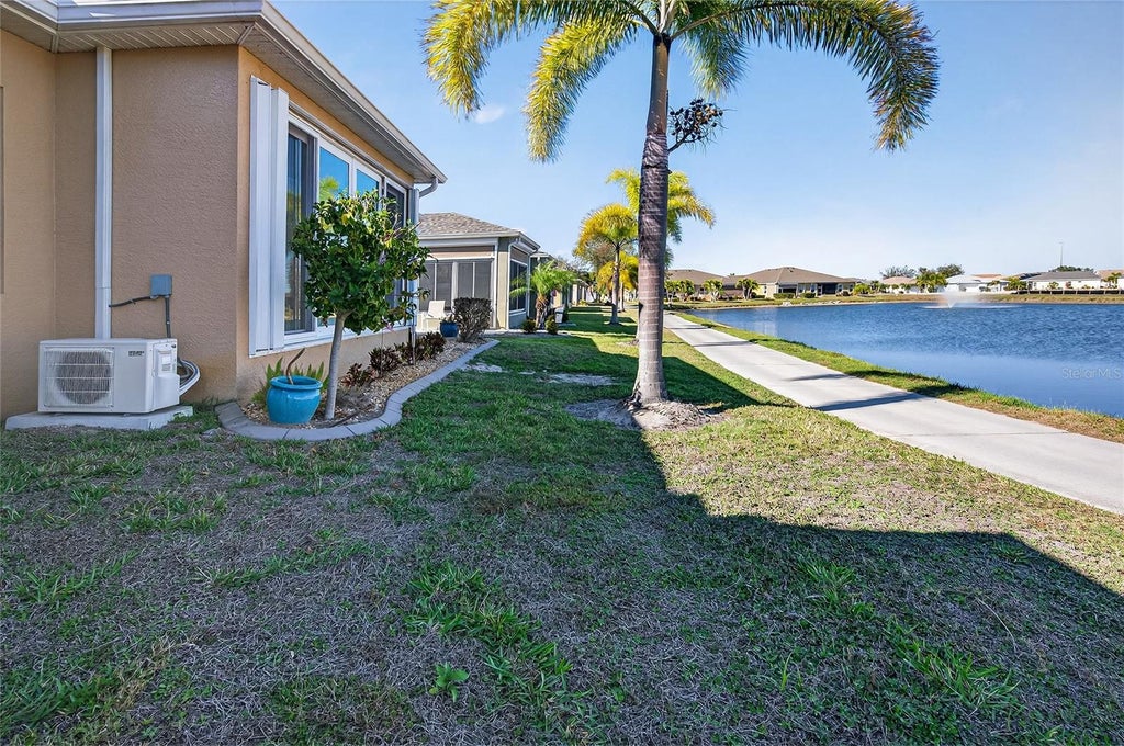 Photo of 1832 Knights Bridge Trail, Port Charlotte, FL 33980 (MLS # C7532168)