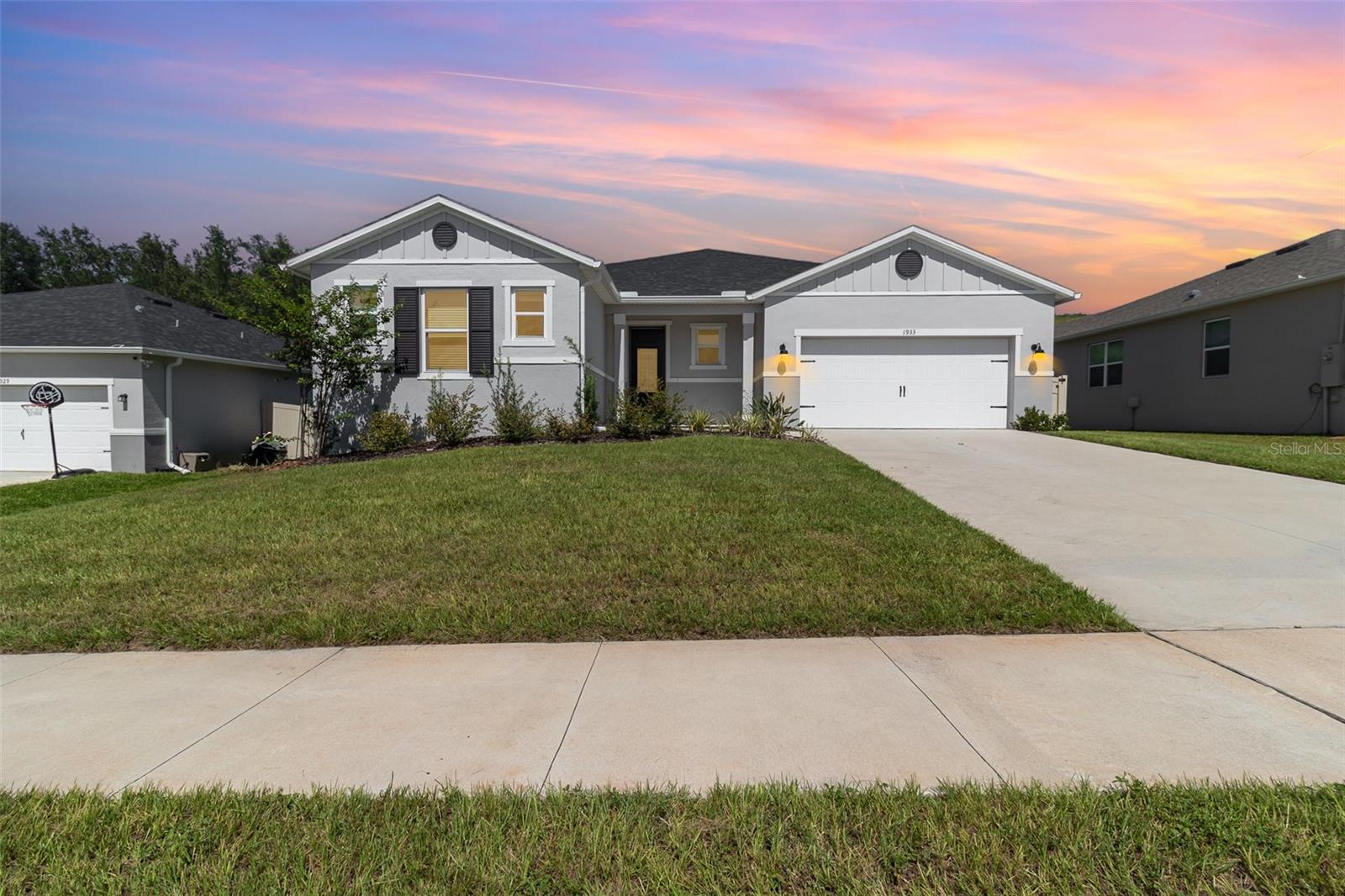 Short Sale. Nearly New Smart Home with Exceptional Upgrades and Immediate Equity Potential!
Welcome to 1933 Burgundy Drive—where luxury, value, and energy efficiency come together in the heart of Minneola. Constructed in 2024 and still under builder warranty, this exceptional home offers the benefits of new construction without the wait, along with thoughtfully curated, high-end enhancements.
Though officially listed as a 3-bedroom, 2-bath, the versatile layout includes a spacious office that can easily convert into a fourth bedroom. Inside, you’ll appreciate upgraded Luxury Vinyl Plank (LVP) flooring throughout—scratch-resistant and durable, ideal for families, pets, and active lifestyles, while providing a sleek, contemporary aesthetic.
The chef-inspired smart kitchen showcases upgraded cabinetry, modern lighting, and intelligent storage solutions, perfectly blending style and functionality. The expansive open-concept layout creates an inviting space ideal for both entertaining and comfortable everyday living.
Relax and unwind in the generously sized primary suite, featuring an upgraded luxury bathroom. Throughout the home, all bathrooms and tubs have elevated finishes, with ample storage spaces thoughtfully integrated.
Additional highlights include owned solar panels (agreement to be assumed by the buyer), providing ongoing energy savings and sustainability. With no rear neighbors, you’ll enjoy a peaceful backyard setting, along with convenient proximity to a newly developed shopping plaza.
This home is priced below the original purchase price, offering the new owner immediate equity upon closing.
Don't miss your chance to own this stylish, energy-efficient, and move-in-ready home in the desirable Reserve at Lake Ridge. Schedule your showing today!