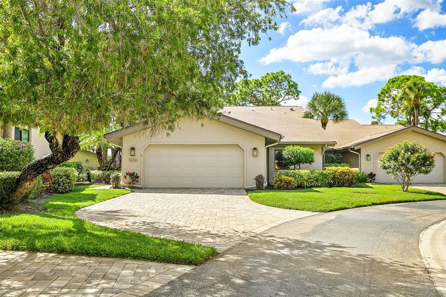 Beautifully updated turn key home in The Meadows! Designer touches in every corner including pecan flooring, modern fixtures, a tropical primary bath, quartz counters, LED lighting, grasscloth feature walls, and custom cabinets. This home encourages rest and relaxation with its zen color palette, loads of natural light and stunning designer accents. Living more like a single family residence, this condo has all rooms on one floor and green views out every window. Fabulous layout with split primary and third bedroom being used as an office. Community pool shaded by lovely live oaks is just steps out the back door. Lanai is enclosed and can be an art studio, extra office or living space. Oversized garage is a bonus and the HVAC was replaced in Oct 2025. If you have been looking for an updated, easy living home this is it! Furniture and art are negotiable. The Meadows is a wonderful community in the heart of Sarasota. It is 15 minutes to downtown, 18 minutes to the airport and 20 minutes to Lido Beach not to mention 5 minutes from UTC shopping centers and teh new MOTE Aquarium.