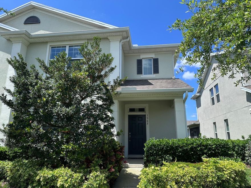 Welcome to this beautifully maintained, corner-lot townhome in the highly sought-after Turtle Creek community! This spacious two-story residence features 4 bedrooms, 2.5 bathrooms, and nearly 2,200 sq. ft. of modern living space. Enjoy total peace of mind with a BRAND NEW ROOF (April 2025) and a brand-new stainless steel refrigerator and dishwasher (2025).The open-concept first floor is anchored by a private primary suite and features sleek tile flooring throughout. The gourmet kitchen is a chef’s dream with granite countertops, 42-inch upper cabinets, soft LED under-cabinet lighting, and ample natural light. Upstairs, discover three oversized bedrooms and a versatile loft—perfect for a home office or media room.The attached 2-car garage boasts a durable epoxy floor, complemented by an extended driveway for two additional vehicles. Turtle Creek offers resort-style amenities including a pool, playground, and walking trails. Located just minutes from Lake Nona, OIA, and SR-417, you are perfectly positioned for world-class dining, shopping, and easy access to East Coast beaches. Don't miss this turnkey gem!