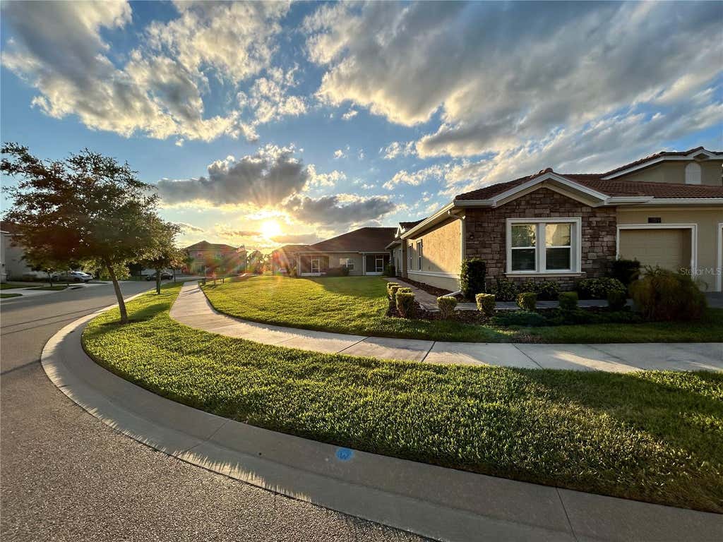 Photo of 1159 Trappers Trail Loop, Davenport, FL 33896 (MLS # O6426263)