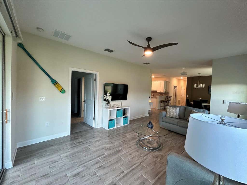 Photo of 1159 Trappers Trail Loop, Davenport, FL 33896 (MLS # O6426263)