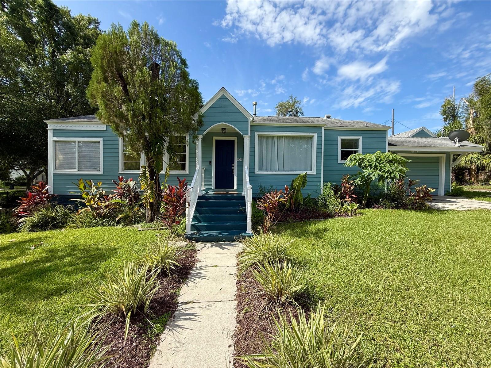Welcome to the charming neighborhood of Ridgewood Park! Take a morning stroll down the tree-lined Glenwood Avenue to visit the local butterfly garden, or walk just two blocks west to Riverside Drive to watch boats drift by along the Hillsborough River. Nearby favorites include Woven Water Brewing Company, Armature Works, Tampa Riverwalk, Ulele, Ricks on the River, Fancy Free Nursery, and so much more!
This well-maintained 2 bedroom, 1 bathroom bungalow offers an open floor plan with a connected living room, dining area, and galley-style kitchen. The bonus sunroom is filled with natural light—perfect for your plant collection, a cozy reading nook, or a cheerful home office setup. The kitchen features quartz countertops and a stylish tile backsplash. A single-car garage offers covered parking or extra storage, and the newer washer/dryer and existing security system are included for added convenience. Out back, enjoy a fully fenced yard—ideal for entertaining or letting your pup play safely.
Rental requirements include: (1) First month’s rent and security deposit due prior to move-in; (2) Monthly household income must be at least 2.5x rent after taxes (no co-signers); (3) Background screening required; (4) No previous evictions (landlord references will be verified); (5) No bankruptcies; (6) Minimum 650 credit score; (7) Verifiable employment and income. Dogs are welcome with approval. Pet restrictions are as follows: (1) One dog max; (2) 50 lbs or less; (3) No aggressive breeds; (4) $350 non-refundable pet fee. Available for immediate occupancy.