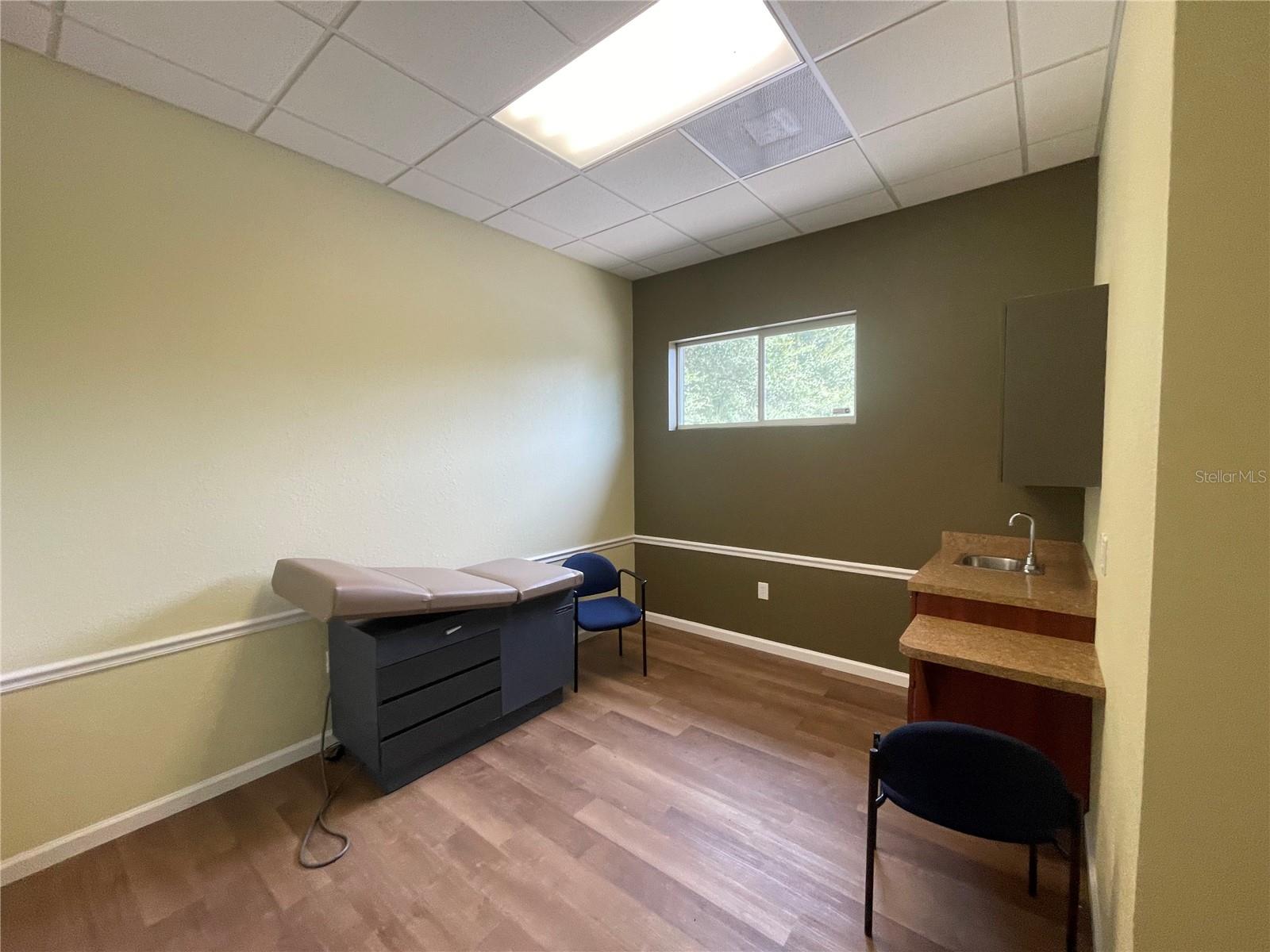 This prime medical office space in West Ocala offers an excellent opportunity for healthcare professionals seeking a convenient, move-in ready location. The suite is approximately 2,300 square feet and features a functional layout with a welcoming lobby and waiting area, a front office and reception space for staff, six exam rooms, and three private multipurpose doctor offices. In addition, there is a central cubicle workstation area, a break room, and two restrooms, providing flexibility and efficiency for a variety of medical uses. There is also a finished bonus upstairs area for storage and additional office space.
The office is located just off Highway 484 at Highway 200, in close proximity to TimberRidge Medical Center and other established healthcare practices, making it an ideal setting within a strong medical corridor. Offered at a below-market lease rate, this property presents an outstanding value for a practice looking to establish or expand in the growing Ocala market.