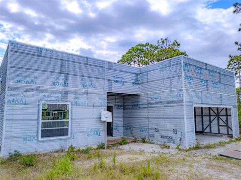 Photo of 840 Gena Road SW, Palm Bay, FL 32908 (MLS # O6298548)