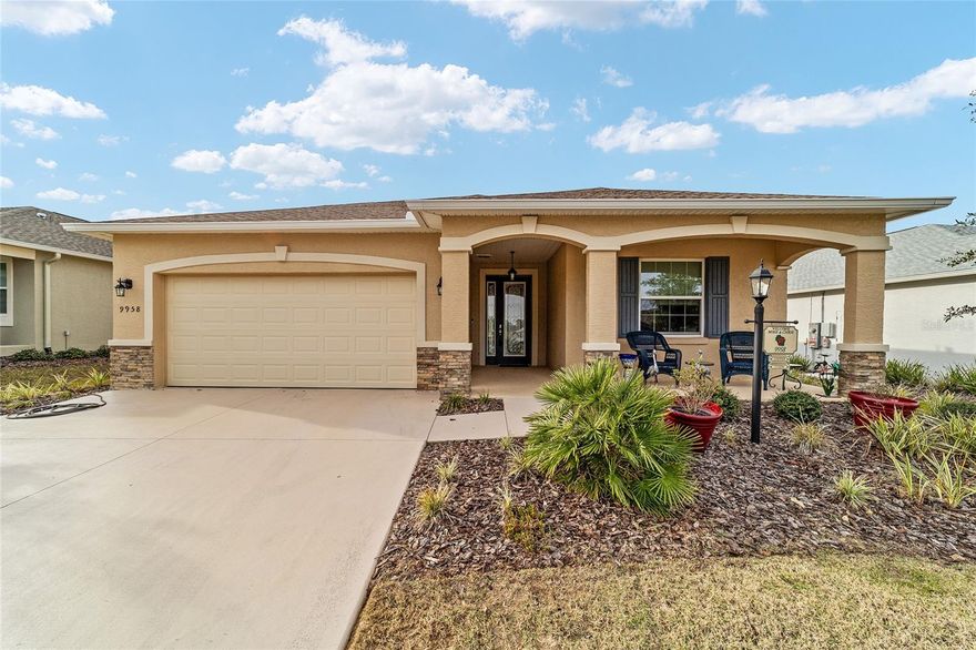 Privacy Lot: Don’t build a new home when you can have this gently used snowbird 2022 “Smart home” Sunflower that has many upgrades.  This 3 bedrooms, 2 full bathrooms and an extended 2 car garage, offers cutting edge Alexa compatible devices for ultimate convenience.  The Kitchen takes center stage, with staggered wood cabinets, featuring a large island with pendant lighting perfect for entertaining and additional seating.  It is equipped with quartz countertops, glass mosaic backsplash, under-cabinet lighting, stainless steel appliances, and a spacious eat-in area, all seamlessly connected to the great room. This home showcases elegant crown molding in the main area, adding a touch of sophistication throughout.  The spacious primary bedroom offers an en suite with a large walk-in tiled shower with duel sinks and quartz countertop.  The upgraded 20x20 ceramic tile flooring throughout adds beauty and durability to the living spaces and accents the custom paint and 9 foot ceilings.  This home includes a screened-in lanai and spacious front porch, offering plenty of room for seating and relaxation.  The seller has also added gutters and a full house water softener. This home is also conveniently located near the Arbors, Health and Rec Center and directly across the street from the mailbox. It features curbside trash and lawncare allowing extra time to experience all of the amenities OTOW has to offer.  The seller is motivated to offer a true turnkey experience by offering a completely furnished or partial furnished home as options.  There is an additional refrigerator in the garage with golf cart, electric bicycles, patio furniture and washer/dryer.  Crescent Ridge 4 is a welcoming community which hosts its own potluck picnics and weekly low stress pickle ball for those who are learning the game. Put this on your list as a must see.