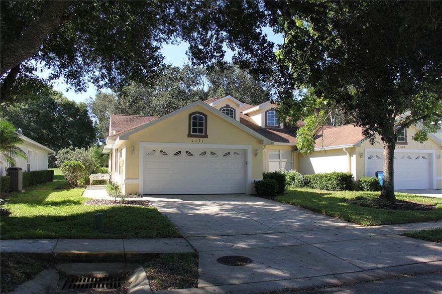 This immaculate 2 bedroom 2 bath home is nestled in behind the 1st hole of Halifax Plantation in Middlemore Landings.  This home has been renovated offering a more modern and move in ready interior.   New flooring throughout with premium vinyl flooring in great room and bedrooms while new ceramic tile in bathrooms, kitchen and foyer. New kitchen cabinets, granite countertops, including a built in pantry, new refrigerator, dishwasher and country style stainless steel sink. New base cabinets, granite, and mirrors in both bathrooms.  Outdoor tile flooring added to the Sunroom/Florida Room.  Electrical outlets were installed in the garage for freezer and workbench.  New epoxy flooring in Garage along with new garage door.  Hurricane Windows added to the east side of home (2020) and roof was replaced in 2019.  Enjoy maintenance free living in Middlemore Landings as your exterior paint, lawn, termite bond and private community pool are included.  Halifax Plantation is minutes away from the beach, Intracoastal waterway, with beautiful views of Oak canopies along the way for a breathtaking drive.  Halifax Plantation provides exceptional features including: 18 holes of golf, clubhouse with restaurant, sports pub and pro shop. Amenities include tennis, pickleball, fitness center and swimming pools.  Minutes away from I95 and A1A for easy commutes to Daytona Beach and/or Palm Coast/Flagler Beach.  This wonderful home is a must see!!  Do not miss out on this gem!