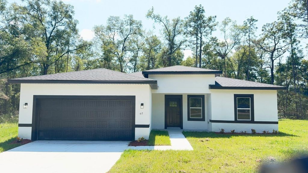 Photo of 42 W Stockel Lane, Citrus Springs, FL 34434 (MLS # O6362916)