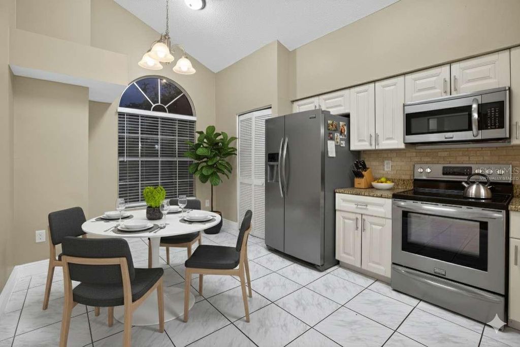 Photo of 12004 W Pond Way, Tampa, FL 33635 (MLS # TB8506080)