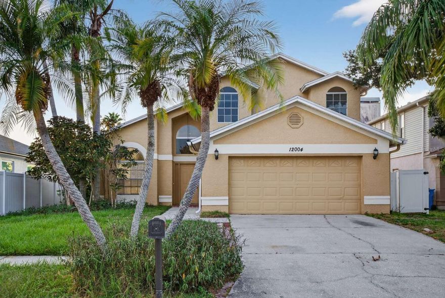Motivated Seller! Explore this beautifully designed 4-bedroom, 2.5-bathroom home in Tampa, offering a great balance of space, comfort, and modern style. Step inside to a bright, open layout with high ceilings and large windows that bring in abundant natural light. The kitchen combines style and functionality, featuring stainless steel appliances, granite countertops, and a breakfast bar. It flows effortlessly into the spacious living area, creating an ideal setting for both entertaining and everyday living. The primary suite offers a private and relaxing retreat with its own ensuite bathroom, while the additional bedrooms provide flexible and well-sized spaces. Outside, enjoy a rear porch, a large fenced backyard, and a covered private pool—perfect for outdoor living and year-round enjoyment. A two-car garage adds convenience with ample parking and storage. With its inviting layout and thoughtful features, this home is ready for its next chapter. One or more photos are virtually staged.