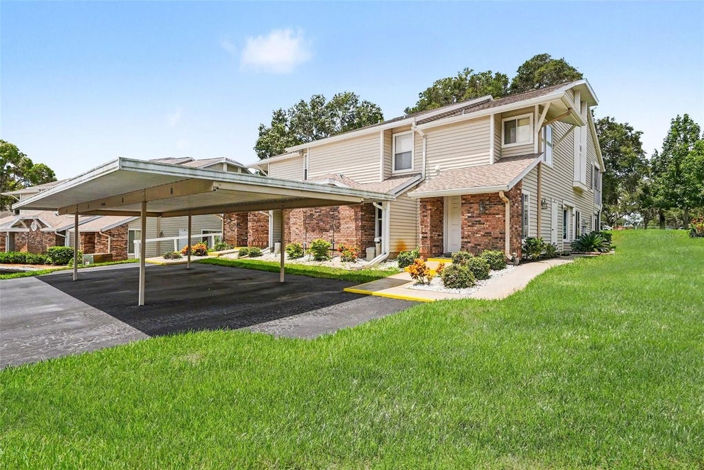 Photo of 12405 Eagleswood Drive #B, Hudson, FL 34667 (MLS # TB8538575)
