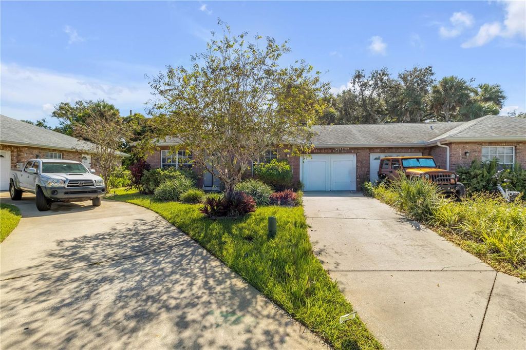 Photo of 711 River Oaks Circle, New Smyrna Beach, FL 32169 (MLS # NS1086192)