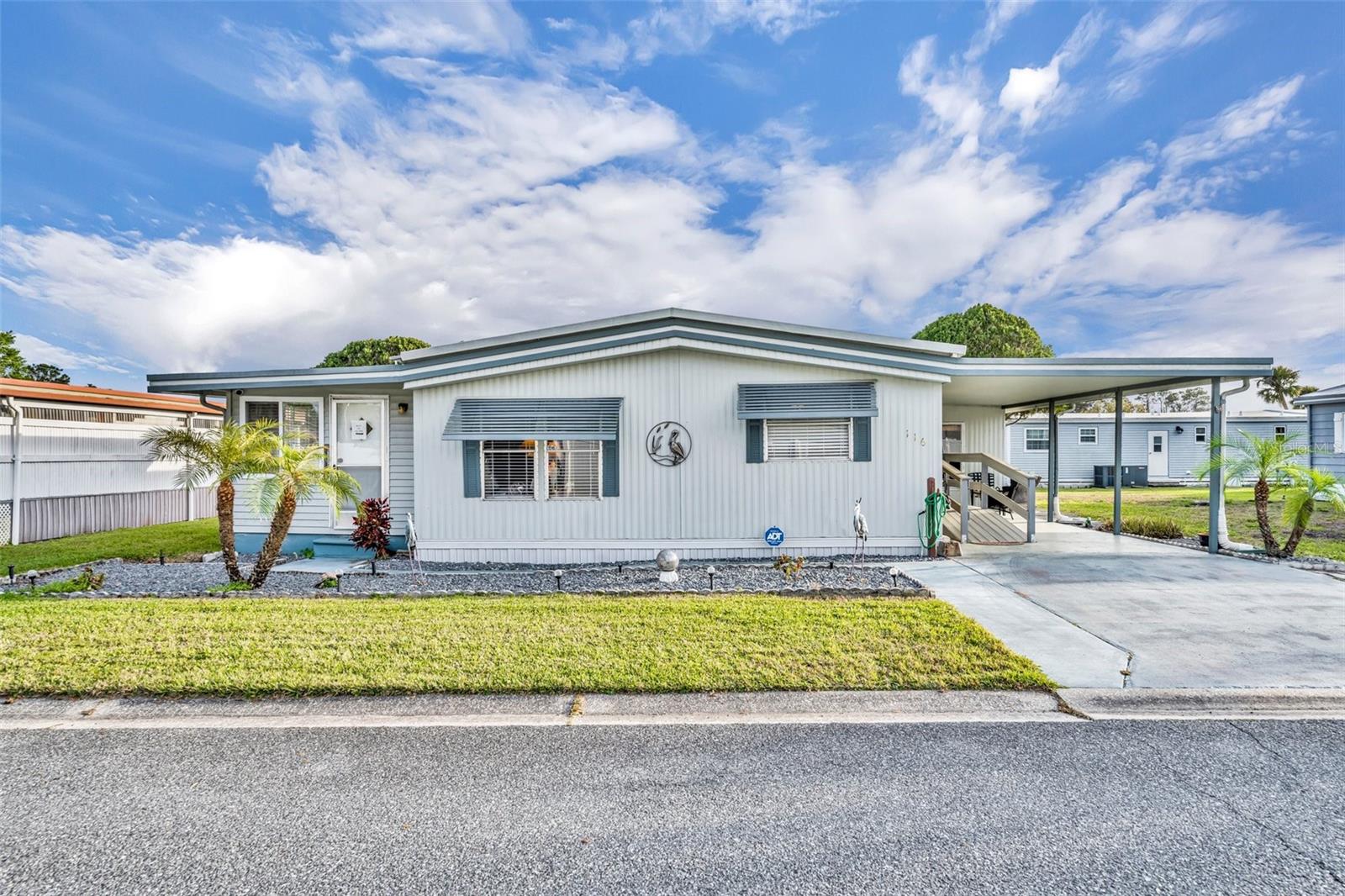 Located in the peaceful 55+ Molokai community, this charming fully furnished doublewide home, built in 1980, offers 1,302 sq. ft. of comfortable living space. It features 2 spacious bedrooms, 2 full baths, and a versatile bonus room—perfect for a home office or hobby space. The kitchen boasts plenty of storage, while the open and airy living room is ideal for relaxing or entertaining. A convenient ramp has
been added for easy access. Situated on a quiet dead-end street, the property also includes a generous workshop—ready to be
transformed into your dream space. The roof was recoated in 2022, 2024 and again in 2025. The living room floor was replaced in 2020
with floating laminate and the bonus room was replaced in Aug 2025. Beyond the home, the Molokai community offers a vibrant lifestyle with a variety of activities to enjoy, as well
as a refreshing community pool to relax and unwind. This home combines comfort, convenience, and a welcoming
community—offering everything you need to enjoy your best years! Schedule your private tour now.