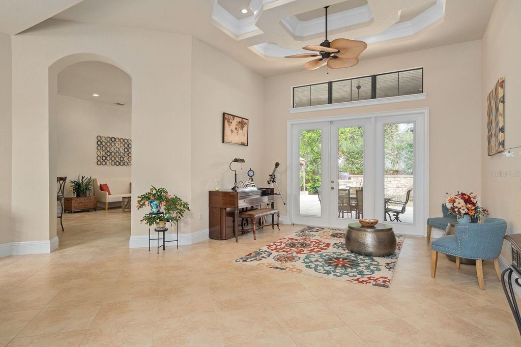 Photo of 5509 Emerson Pointe Way, Orlando, FL 32819 (MLS # O6369643)