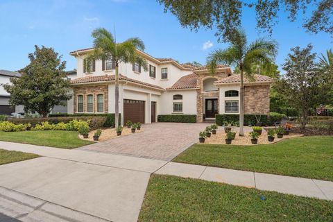 Photo of 5509 Emerson Pointe Way, Orlando, FL 32819 (MLS # O6369643)