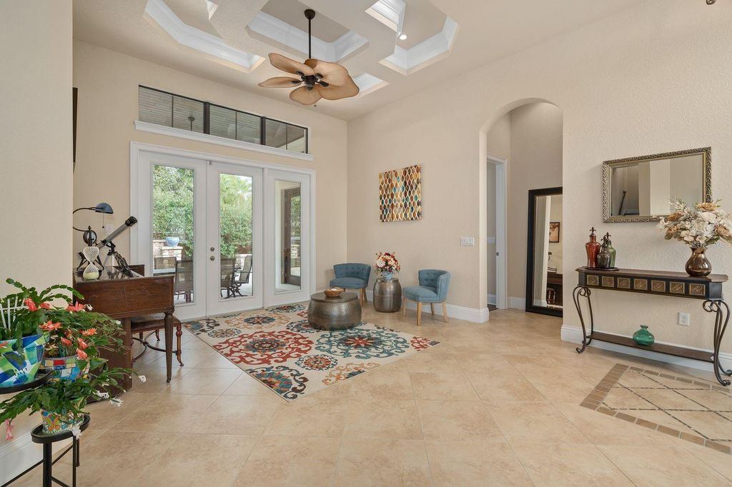 Photo of 5509 Emerson Pointe Way, Orlando, FL 32819 (MLS # O6369643)