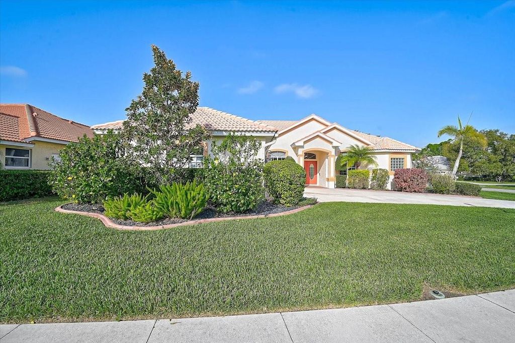 Photo of 4422 Mcintosh Lake Avenue, Sarasota, FL 34233 (MLS # A4686220)