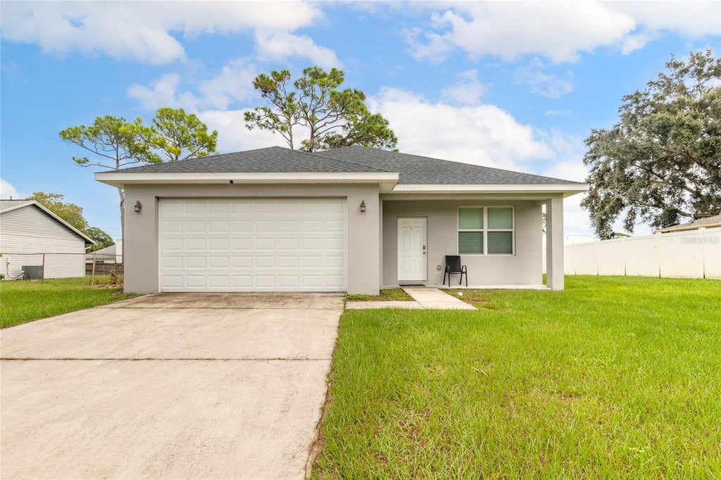 Photo of 2625 Travelers Palm Drive, Edgewater, FL 32141 (MLS # NS1089466)