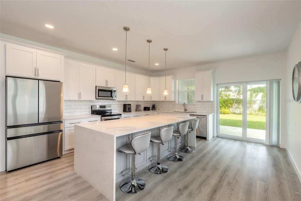 Photo of 2625 Travelers Palm Drive, Edgewater, FL 32141 (MLS # NS1089466)