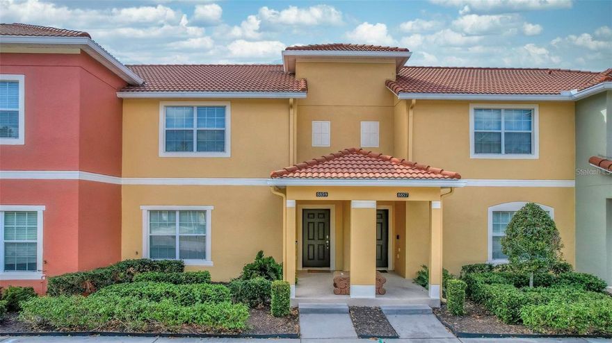 MUST SEE! Own a piece of paradise with this stunning, fully furnished waterfront townhome in the premier guard-gated resort of Paradise Palms! This 1,900+ sq. ft. retreat is a versatile powerhouse, perfect as a turnkey Airbnb, a high-performing long-term rental, or your own private personal residence. Meticulously maintained, the home features a newer AC system, elegant LVP flooring in the Master, crown molding, and designer accent walls. Guests and family will love the immersive Star Wars and Mickey Mouse themed rooms, while the chef-inspired kitchen boasts granite counters, stainless appliances, and solid wood cabinetry. Step through the spacious family room to your private heated pool and deck, where you can lounge and dine overlooking serene water views. Perfectly situated just a short walk from world-class amenities—including a movie theater, tiki bar, and resort pool—and only minutes from Disney, water parks, and premier dining. The HOA offers total peace of mind, covering cable, internet, lawn care, and 24-hour guarded security. Don’t miss this incredible investment opportunity—schedule your showing today!