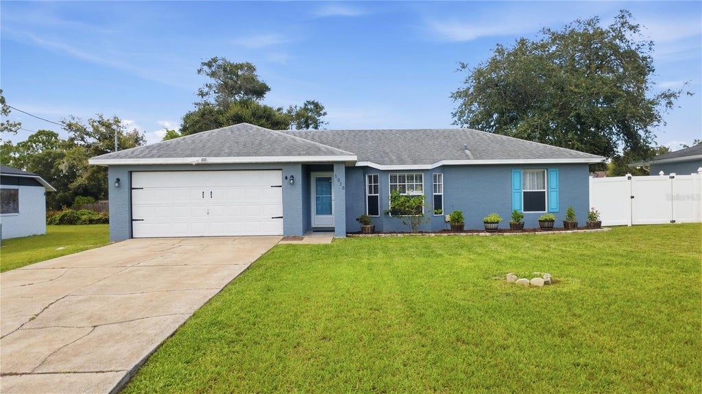 Photo of 1313 Herndon Avenue, Deltona, FL 32725 (MLS # V4951239)