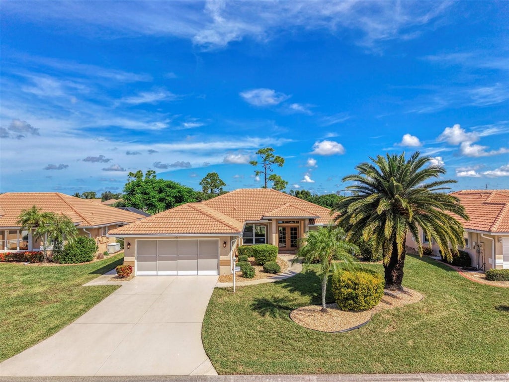 Photo of 8261 Lakeside Drive, Englewood, FL 34224 (MLS # D6148705)
