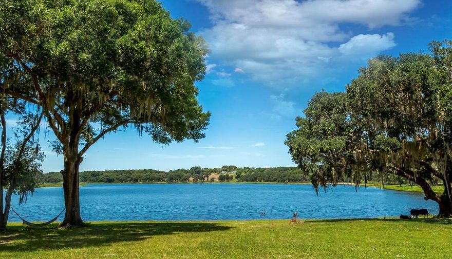 Welcome to this stunning property located at 34710 Clayton Rd, Lot 13 in Dade City, FL. This ACRE lot overlooking Blanton Lake provides a prime opportunity to build your dream home amidst beautiful surroundings. The spacious lot provides ample room for creative landscaping and outdoor activities. Enjoy the tranquility of the area while being conveniently close to local amenities and attractions. Don't miss the chance to own a piece of this charming private waterfront community. Builder offering multiple land opportunities.