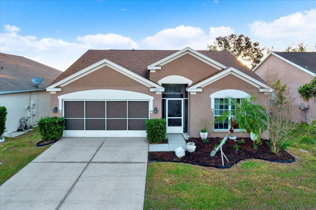 Photo of 12612 Midpointe Drive, Riverview, FL 33578 (MLS # TB8446566)