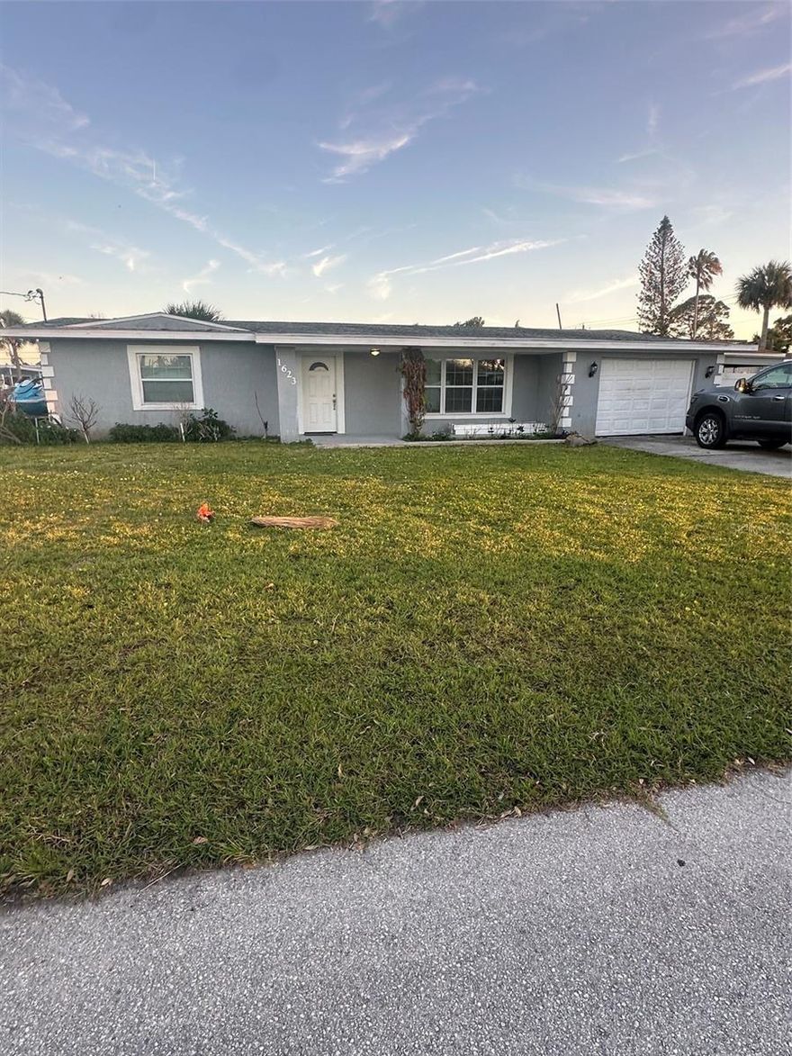 Waterfront living in the heart of Merritt Island! This beautifully updated canal-front home offers the perfect blend of modern finishes and laid-back Florida lifestyle. Step inside to an open and inviting floor plan featuring wood-look tile flooring throughout, neutral designer tones, and abundant natural light. The renovated kitchen showcases rich wood cabinetry, stainless steel appliances, stylish backsplash accents, and plenty of counter space for cooking and entertaining.

The spacious living area flows seamlessly to the dining space, creating an ideal setup for gatherings and everyday comfort. Outside, enjoy a large front lawn with excellent curb appeal and the benefits of canal access for boating, kayaking, fishing, or simply relaxing by the water.

Conveniently located near beaches, shopping, dining, and top commuter routes, this move-in-ready Merritt Island home is your chance to enjoy the best of Florida waterfront living.