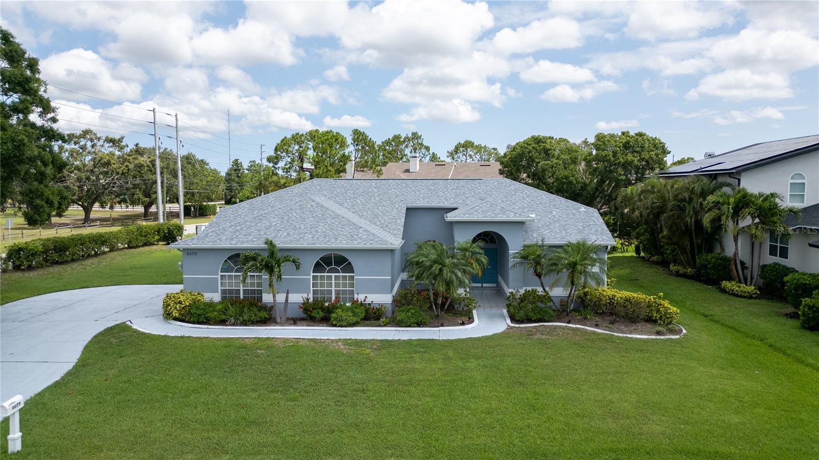 PRICE SLASHED FOR A QUICK SALE! A TRULY GREAT OPPORTUNITY!
Welcome to your dream home in the prestigious Seminole Golf and Country Club, just minutes from some of the Gulf Coast’s most breathtaking beaches. This executive-style pool home is the perfect blend of refined design and relaxed coastal living, boasting an exceptional split floor plan thoughtfully designed for entertaining and everyday luxury.
Step inside to find a light and breezy coastal-inspired color palette, soaring cathedral ceilings, and thick crown molding that add character and elegance throughout the home. The open-concept living area flows seamlessly into a spacious chef’s kitchen featuring hardwood cabinetry, stainless steel appliances, gas cooking, and plenty of counter space—perfect for gathering with friends and family.
The family room is a showstopper, with a custom quartz entertainment wall, pre-wired for home entertainment, creating an inviting space to relax or host a movie night.
Retreat to your private oversized master suite, complete with his and hers walk-in closets and a luxurious master bath. The additional bedrooms are ideally located on the opposite side of the home, offering privacy for guests or family members.
Step outside to enjoy Florida living at its best. The newly resurfaced pool is the centerpiece of a beautifully designed outdoor space, ideal for weekend barbecues or quiet evenings under the stars. A 3-car garage offers room for your vehicles, golf cart, or hobby gear—perfect for the car enthusiast or active lifestyle.
Additional highlights include a tankless gas water heater, large laundry room, and a newer roof, offering peace of mind and modern comfort.
Live the lifestyle you deserve in this stunning, move-in ready home—where coastal charm meets executive flair.
This home has a small flood premium of only $915.00 and is assumable. This home, and all of the other homes on the street, have NEVER flooded.
