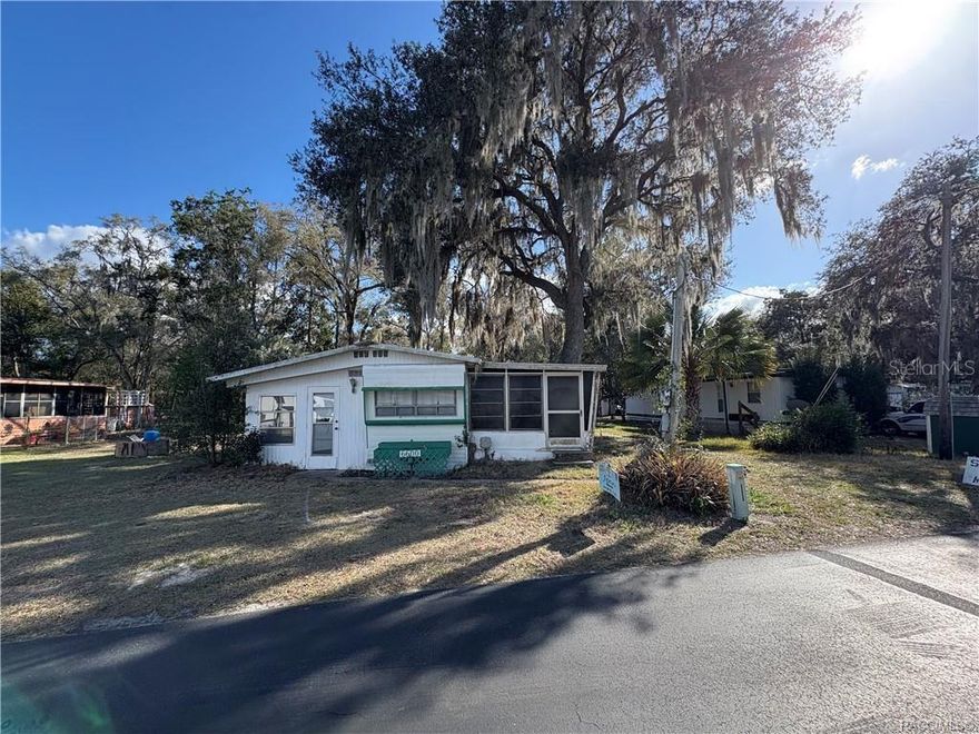 Charming mid-century mobile home in the 55+ community of Lakato Haven! This adorable 1-bedroom, 1-bath home offers a cozy and affordable Florida retreat with lake access for boating and fishing. Sun room off of the kitchen. The property features a large yard to have a plentiful garden and still plenty of room for your boat, making it easy to enjoying the Florida lifestyle.Two storage buildings with power provide excellent extra space—one includes water and washer/dryer hookups, offering great flexibility for laundry or workshop use. Whether you're looking for a winter getaway or year-round living, this cute home is full of potential! It will need some upgrading and updating.