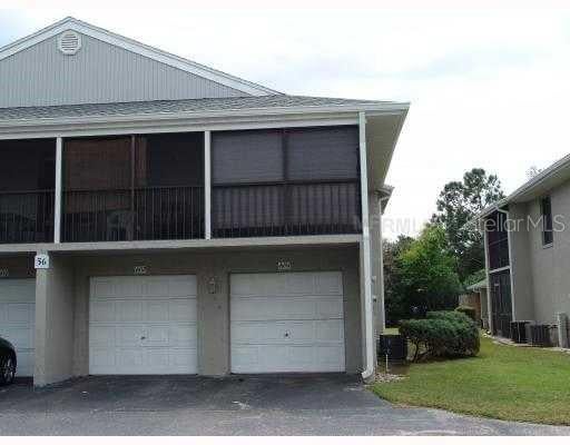 Photo of 4452 Pinebark Avenue #56-3, Orlando, FL 32811 (MLS # O6424973)