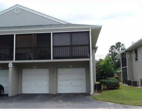 Photo of 4452 Pinebark Avenue #56-3, Orlando, FL 32811 (MLS # O6424973)
