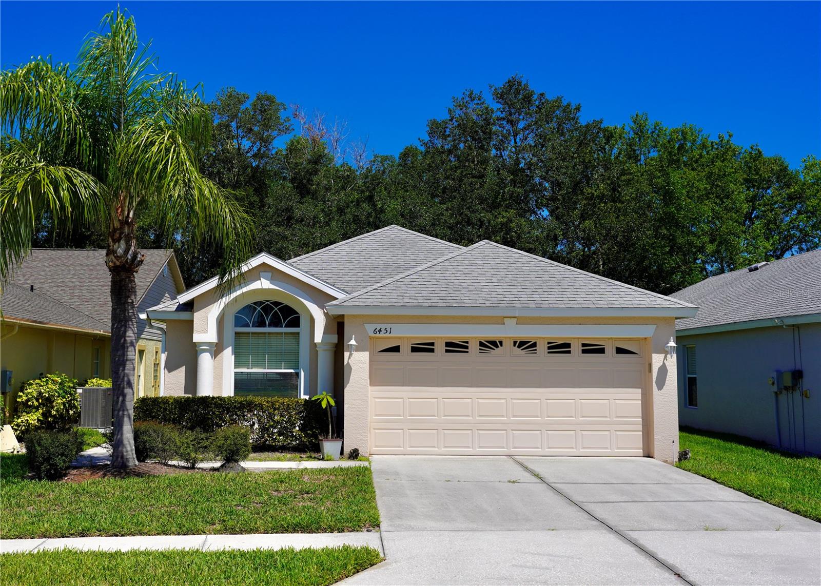 Welcome to this charming home located in Wesley Chapel. This beautifully maintained residence offers a spacious layout with 2 bedrooms, 2 bathrooms, and an additional office space, spanning a generous 1,699 square feet. Upon entering, you'll be greeted by an inviting atmosphere, filled with natural light that illuminates the open-concept living areas. The primary bedroom provides a tranquil retreat with its comfortable size and en-suite bathroom, offering a walk-in shower, and dual vanities. The second bedroom is equally spacious and offers flexibility for use as a guest room or home office. This residence boasts a convenient location, close to the vibrant Tampa Premium Outlets, where you can indulge in premier shopping, dining, and entertainment experiences. Major highways are easily accessible, allowing for a seamless commute to Tampa and other surrounding areas. In addition to its prime location, this home is nestled within a quiet neighborhood, providing a peaceful oasis to come home to after a long day. Imagine unwinding on the screened-in patio, enjoying the gentle Florida breezes and overlooking the beautifully landscaped backyard. The required HOA membership includes exterior bi-weekly pest control, garbage, lawn services, and irrigation maintenance, in addition to exterior painting every 7 years. Don't miss this opportunity to own a lovely home in Wesley Chapel, offering comfort, convenience, and a tranquil lifestyle. Contact us today to schedule a showing and make this delightful property your own.