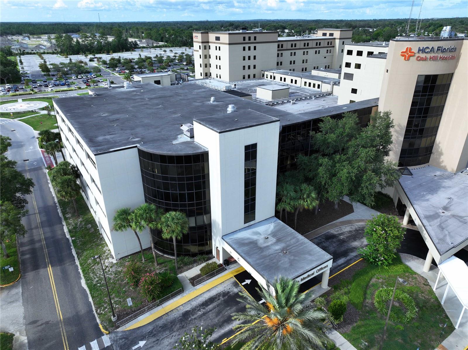Turnkey Medical Office in HCA Oak Hill Hospital – Prime Top-Floor Location. Exceptional opportunity to own a 2,070 sq. ft. fully built-out medical office suite located on the top floor of the distinguished HCA Oak Hill Hospital in Brooksville, FL. This well-appointed space features 7 exam rooms, 2 separate waiting rooms (each with private entrance and shared exit), a spill-over waiting area, large nurses station, lab, break room, IT and utility closets, and 3 bathrooms—including a private ensuite with shower in the physician’s office. Additional highlights include newer water heater, extremely low monthly maintenance, and thoughtful design ideal for multi-provider use or high-volume practice. An unbeatable location for any healthcare provider ready to start or grow their practice in a renowned, highly visible, high-traffic area off Cortez Blvd/State Road 50, within a well-established medical hub. 42,500 ANNUAL AVERAGE DAILY TRAFFIC COUNT on SR-50/Cortez Blvd. Hernando County is undergoing rapid growth, with new residential communities and apartment complexes nearing completion—bringing a steady influx of potential patients and making now the ideal time to establish or expand your practice in this thriving area.
