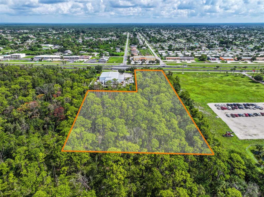 Photo of 12986 Tamiami Trail S, North Port, FL 34287 (MLS # A4701939)