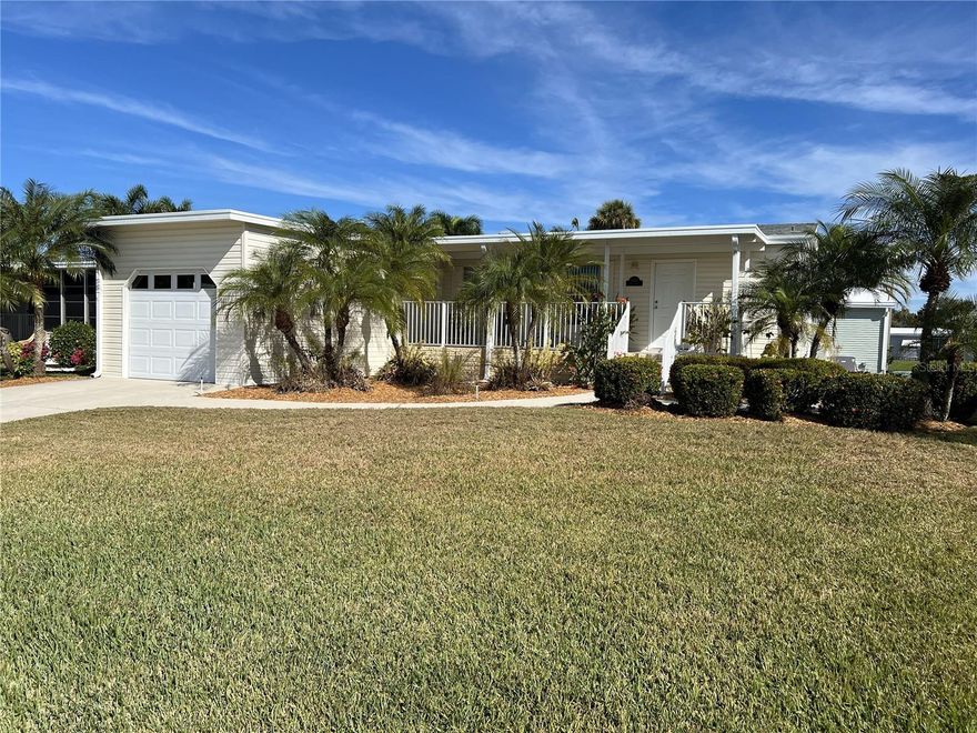 WHAT A GEM!  This 2 bedroom/2 bath abode is a Florida Gulf Coast lovers’ MUST SEE!  Boasting an abundance of natural light shining throughout, this 1080 sf beauty is conveniently located near I-75 in the premier 55+ Imperial Lakes community close to the world-famous gulf beaches, minutes from the Factory Outlet Mall and a plethora of restaurants.  This beautiful home welcomes you with a lovely yard complete with well-maintained landscaping and a serene front porch perfect for relaxing in the warm Florida sunshine.  Proceeding through the inviting entrance, you are greeted by a spacious foyer into a cozy, open floor plan with a spacious kitchen overlooking the bright, airy living space.  This dwelling is complete with a washer and dryer, an attached garage and a separate golf cart garage perfect for housing your neighborhood transportation or for extra storage.  Do not miss out on this well-situated Florida haven… a dream for residents and vacationers alike!