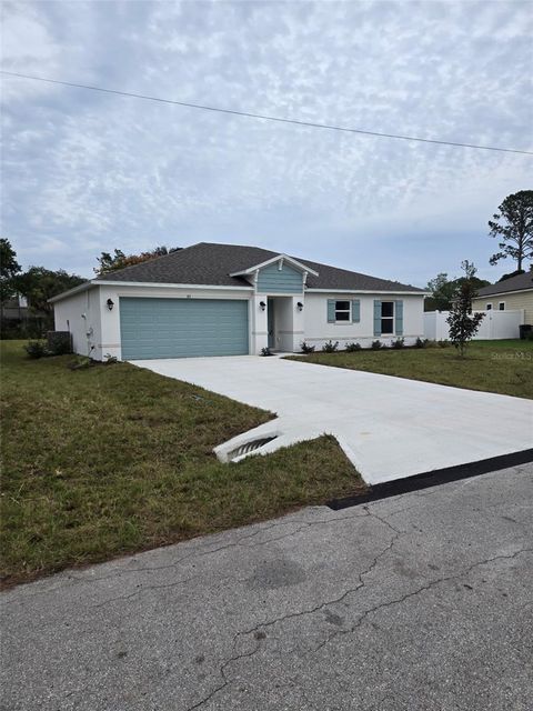 Photo of 83 Forsythe Lane, Palm Coast, FL 32137 (MLS # O6359148)