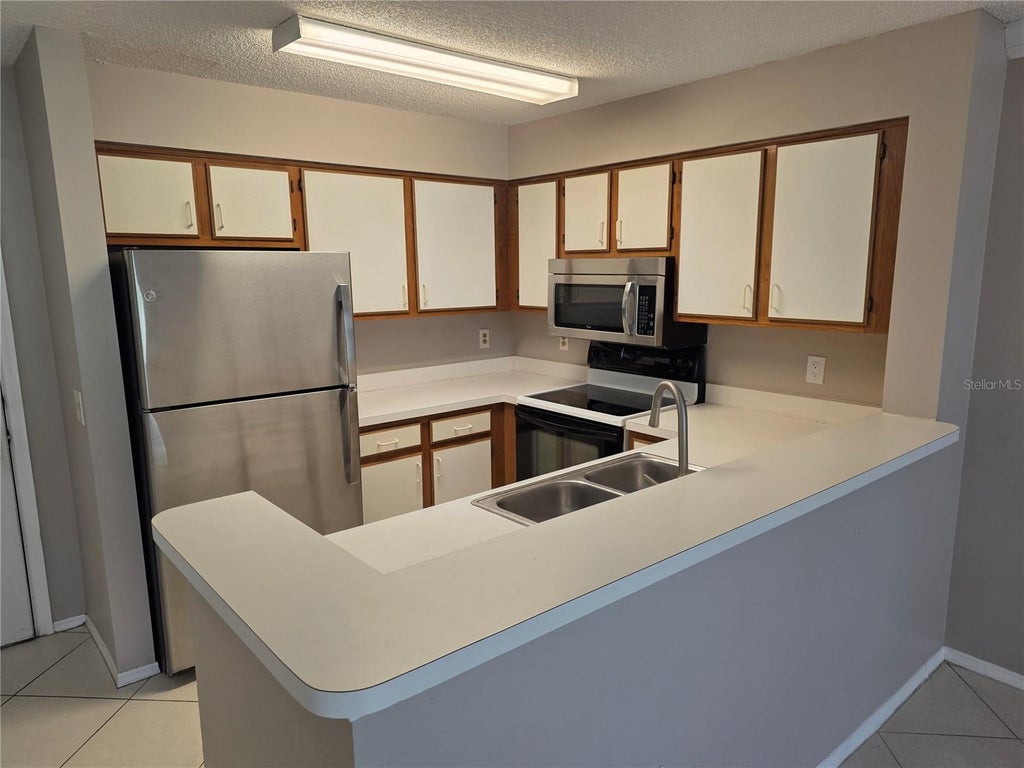Photo of 2400 Feather Sound Drive #226, Clearwater, FL 33762 (MLS # TB8552819)