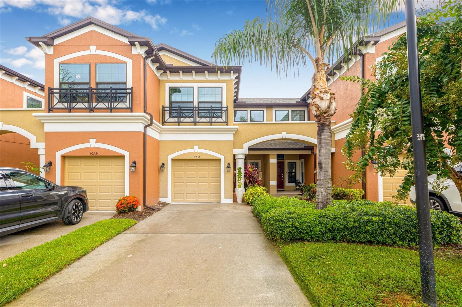 Welcome to easy living in the gated community of West Lake! This fabulous 3-bedroom, 2.5-bath townhome was built in 2018 and is move-in ready with lawn maintenance included. Enjoy a beautiful kitchen featuring an oversized quartz island, white shaker cabinets, a large pantry, and a top-of-the-line refrigerator with a built-in Keurig coffee system. Tile floors flow throughout the main level, opening to a peaceful pond view and covered lanai with ceiling fan—perfect for relaxing. Upstairs, hardwood stairs lead to all three bedrooms, including a spacious primary suite with dual sinks and a huge walk-in closet. Additional perks include upstairs laundry, hurricane shutters, a 1-car garage, and access to the heated community pool. Best of all, this home offers an assumable VA loan-an incredible opportunity for eligible buyers. All just minutes to shopping, dining, hospitals, Tampa International Airport, and under an hour to the stunning Gulf beaches!