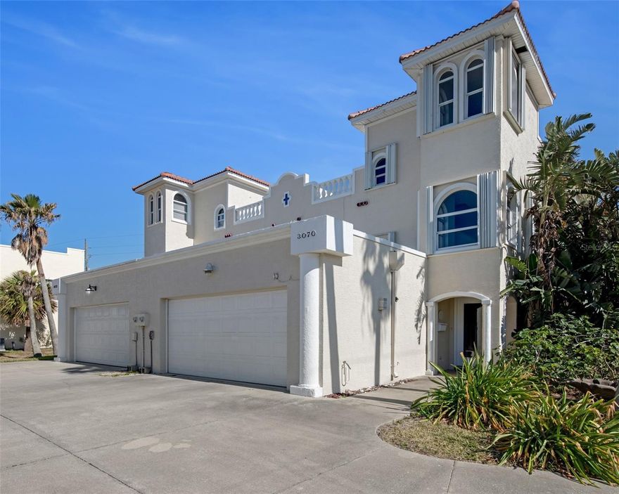 Ocean Front Home with 3 Beds, 2.1 baths, 2 car garage & NO HOA DUES! 1 month rentals allowed! THE most STUNNING Direct Oceanfront views from this awesome, Mediterranean Style, 3 story attached home in peaceful Ormond By the Sea! NEW ROOF, and inside/outside paint in the last 4 years! Fabulous, inviting, and exciting open air outdoor terrace! This has 2 primary suites...One on the 1st floor! One on the 2nd floor! Imagine sipping your morning coffee watching the glorious sun rise each day, or dining out evenings Al Fresco on your 3rd floor, 40 ft. open air patio! Enjoy your favorite beverage under the moonlight & stars! Beautiful home with open spacious rooms. Kitchen has tons of cabinetry. The attached home could be bought as well for rental or having family nearby! Laundry area on the first floor! FABULOUS property without a doubt! Ormond By the Sea is a MOST wonderful beachy area! Some photos virtually staged & may be of attached home and available as a package deal!