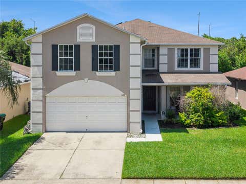 Photo of 644 Flower Fields Lane, Orlando, FL 32824 (MLS # O6425681)