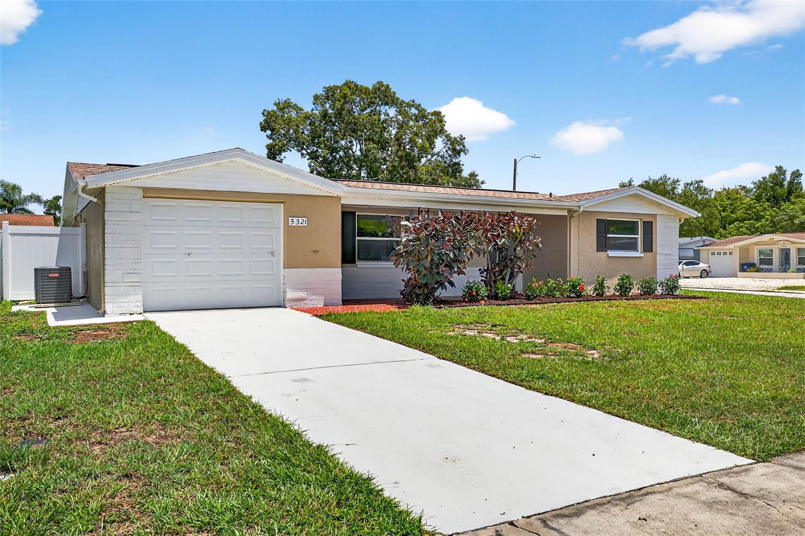Move-In Ready & Priced to Sell!
Don’t miss this beautifully renovated 3-bedroom, 2-bathroom block home located on a spacious corner lot with NO HOA and NO flood zone! Featuring a 1-car garage and fully fenced yard, this property offers privacy, functionality, and peace of mind.
Step inside to discover a thoughtfully designed open floor plan filled with natural light from brand-new energy-efficient windows. Every detail of this home has been updated with high-quality finishes and pride in craftsmanship.
The stunning modern kitchen boasts new stainless steel appliances, granite countertops, stylish cabinetry, and an eye-catching herringbone backsplash—perfect for everyday living and entertaining. Both bathrooms have been completely upgraded with large vanities and matching granite countertops for a cohesive, luxurious feel.
Enjoy your morning coffee or unwind in the evening on the covered front porch or relax in the screened lanai, offering outdoor comfort year-round. With ample storage and space for toys or hobbies, this home fits a variety of lifestyles.
Conveniently located east of Hwy 19, you're just minutes from shopping, dining, hospitals, golf courses, and public transportation—plus only 26 miles to Tampa International Airport. Schedule your showing today!