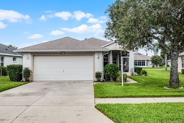 Welcome to the Florida lifestyle you’ve been dreaming of! This immaculate 3-bedroom, 2-bath home offers 1,477 sq. ft. of beautifully designed living space with peaceful pond views in the vibrant 55+ Legacy of Leesburg community. Step inside to a light and airy open floor plan perfect for both relaxing and entertaining. The spacious kitchen is a chef’s delight, featuring brand-new stainless steel appliances (2024), abundant cabinetry, generous counter space, a cozy breakfast nook, and a convenient pass-through to the dining area.
The luxurious primary suite is a private retreat, complete with direct access to the screened patio, a large walk-in shower, and a soothing garden tub. Two additional bedrooms and a full bath offer plenty of space for guests or hobbies. Enjoy easy-care laminate flooring throughout the main living areas and bedrooms, and rest easy with a roof replaced in December 2019.
Step out to the screened patio to take in the tranquil pond views, perfect for morning coffee or evening relaxation. Legacy of Leesburg offers a resort-style lifestyle with amenities galore, including a beach-entry pool and spa, fitness center, tennis, pickleball, bocce, shuffleboard, nature trails, RV storage, and more. The HOA fee includes gated community, cable TV, internet, and lawn care for truly carefree living.
Conveniently located near shopping, dining, medical facilities, and major roadways, this move-in-ready gem is a rare find. Don’t wait, schedule your private tour today and start living the good life!