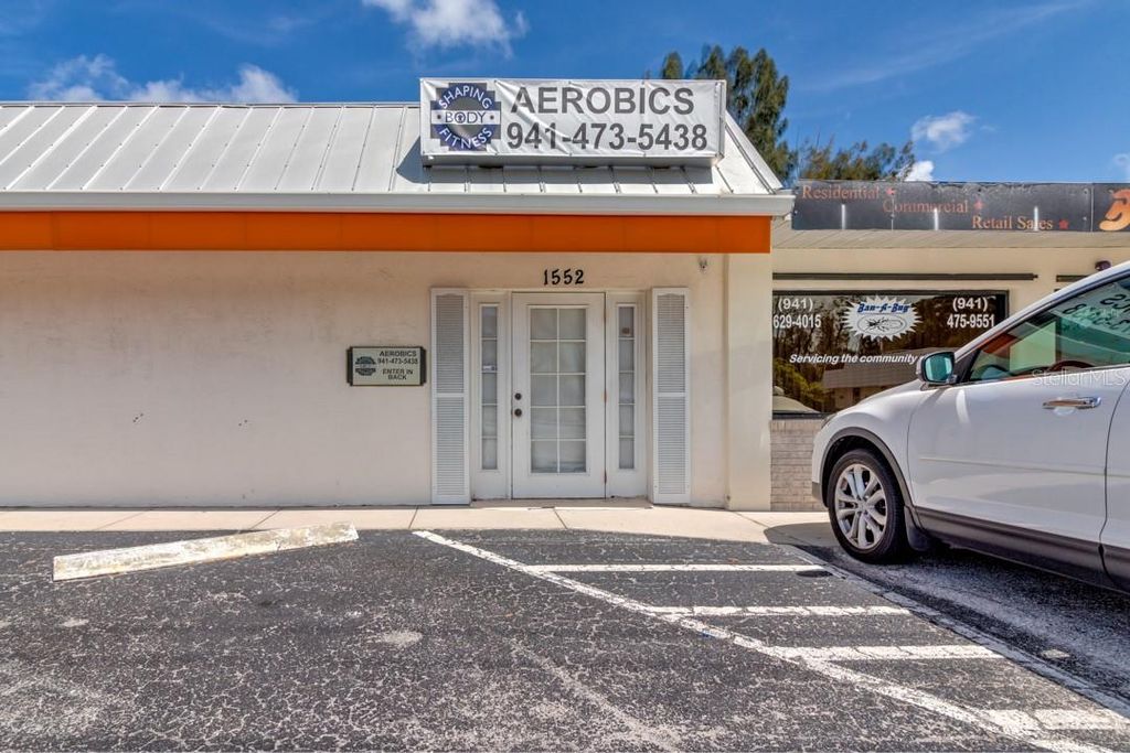 Photo of 1552 S Mccall Road, Englewood, FL 34223 (MLS # D6143852)
